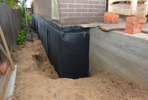 Happy homeowners after waterproofing job in Bridgeport